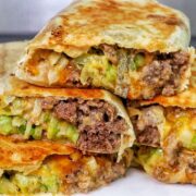 A stack of Big Mac wraps, sliced in half to show the inside.