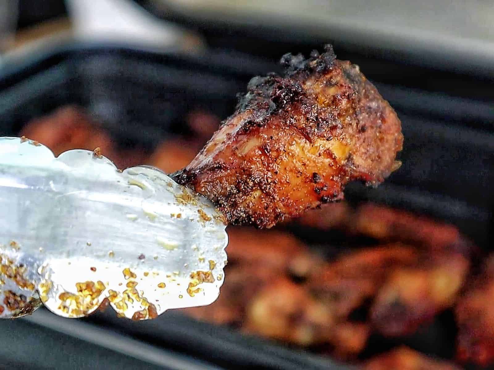 crispy dry rub chicken wings, golden-brown with a perfectly seasoned crust.