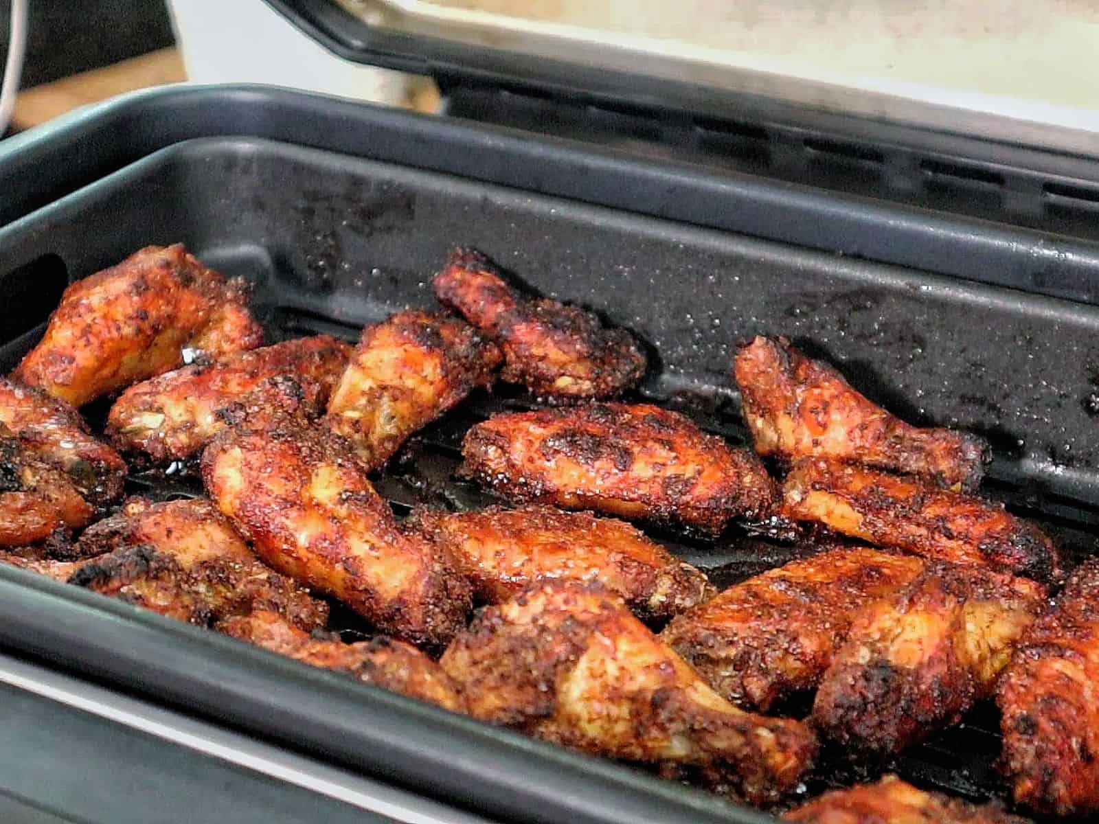 crispy dry rub chicken wings, golden-brown with a perfectly seasoned crust.