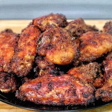 crispy dry rub chicken wings, golden-brown with a perfectly seasoned crust.
