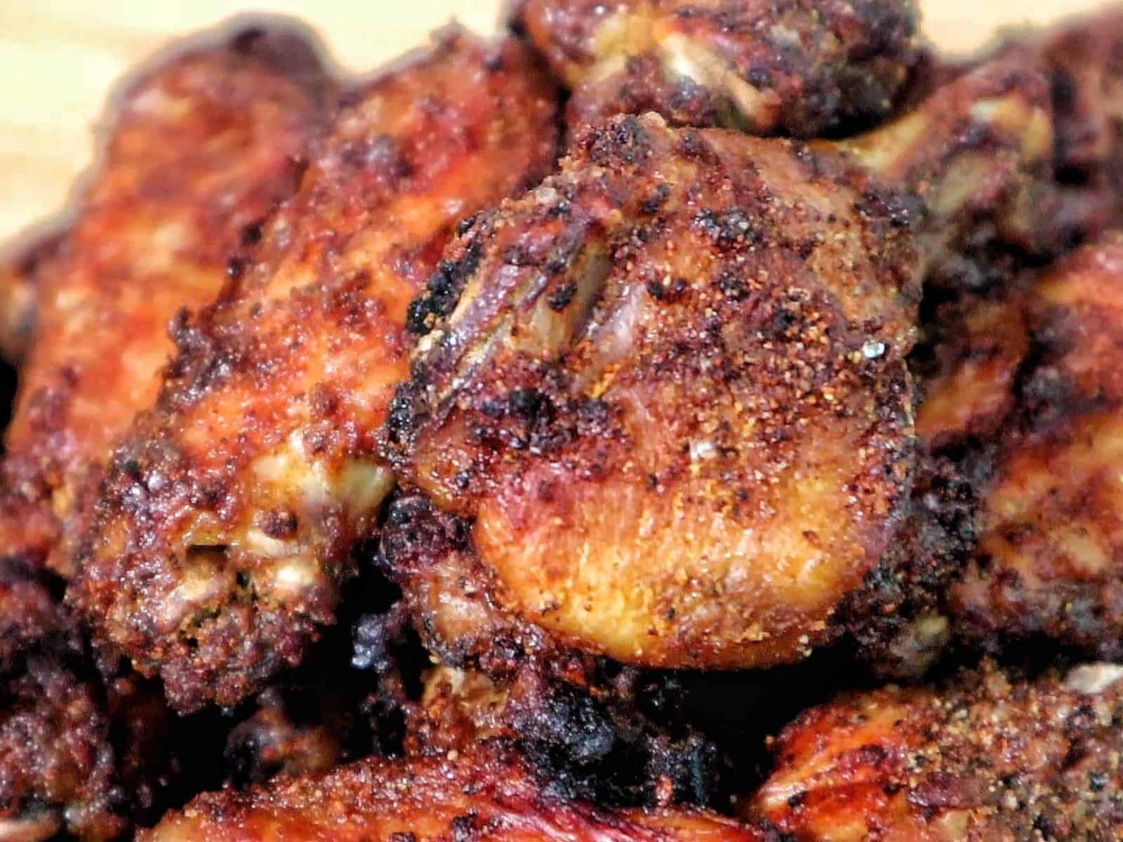 crispy dry rub chicken wings, golden-brown with a perfectly seasoned crust.