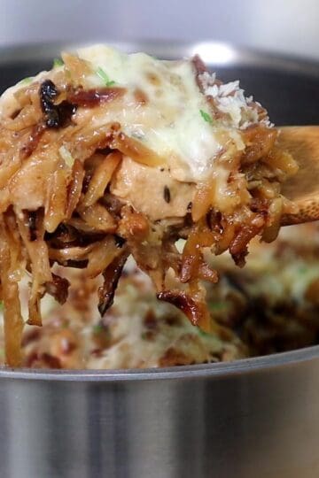 Golden, cheesy French onion chicken casserole made with orzo pasta, caramelized onions, shredded chicken, and melted mozzarella