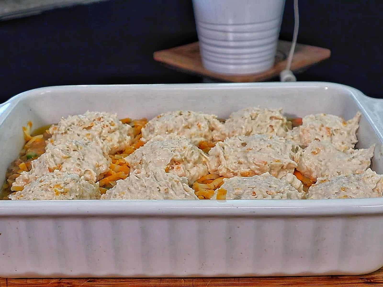 Cheddar Bay beef cobbler with a golden biscuit topping, layered over a creamy ground beef and vegetable filling.