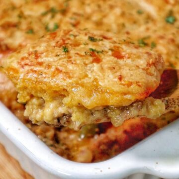 Cheddar Bay beef cobbler with a golden biscuit topping, layered over a creamy ground beef and vegetable filling.