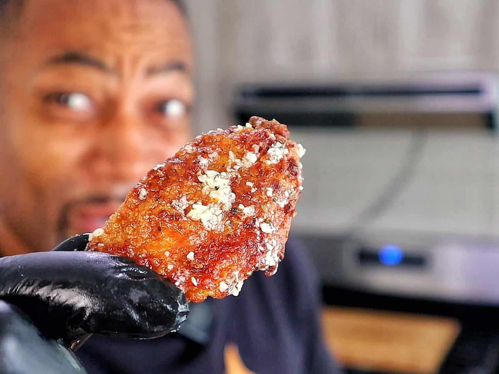 Crispy golden brown garlic Parmesan chicken wings coated in a buttery garlic sauce and topped with grated Parmesan cheese.