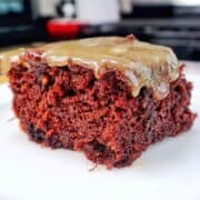 A rich chocolate banana bread brownie topped with a brown butter glaze, sliced into thick squares with a moist and fudgy center.