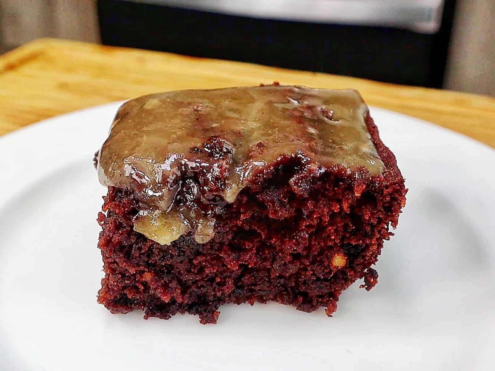 A rich chocolate banana bread brownie topped with a brown butter glaze, sliced into thick squares with a moist and fudgy center.