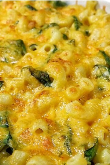 creamy homemade macaroni and cheese made with elbow pasta, fresh spinach, and a rich blend of cheddar, mozzarella, Parmesan, and cream cheese.