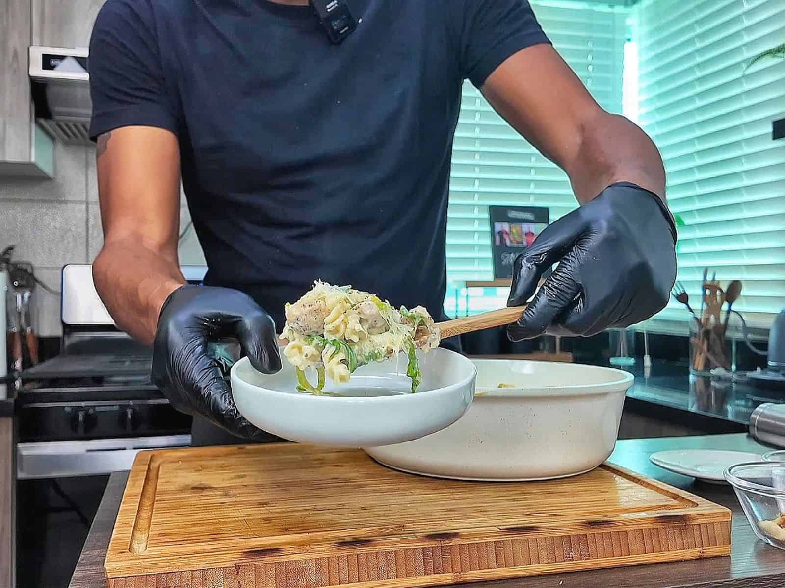 Creamy One Pot Chicken Caesar Pasta with tender seasoned chicken, penne pasta, Parmesan cheese, Caesar dressing, chopped romaine and crunchy croutons.